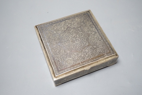 A Persian engraved white metal and niello cigarette box, stamped 84, 11.9cm, gross 12.5oz.